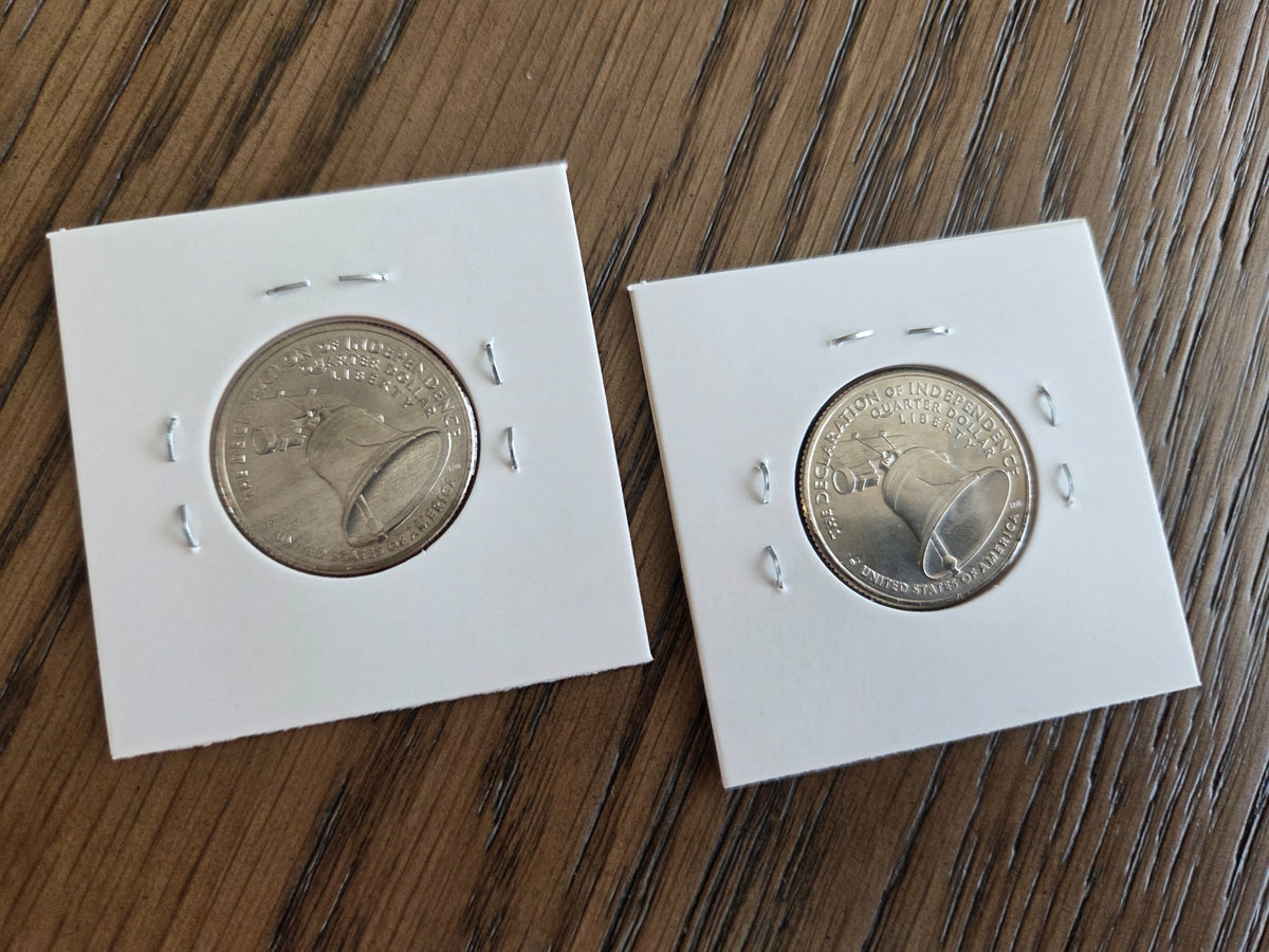 2026 P and D Declaration of Independence quarter pair, reverse, photographed in coin holders