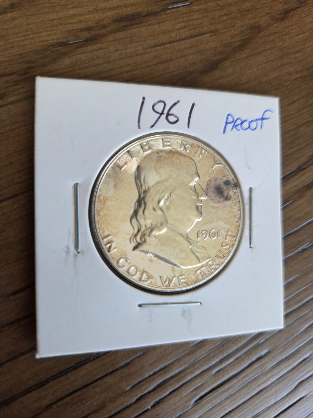 1961 Franklin Proof Half Dollar close-up showing dark spot near obverse rim, exact coin, SKU FH0017