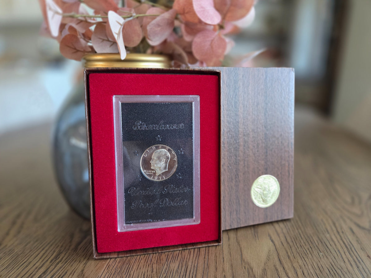 1971-S Eisenhower silver Proof dollar with reflective fields — obverse in original case and brown box
