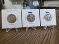 Obverses of exact three-coin Standing Liberty quarter lot SLQ0003