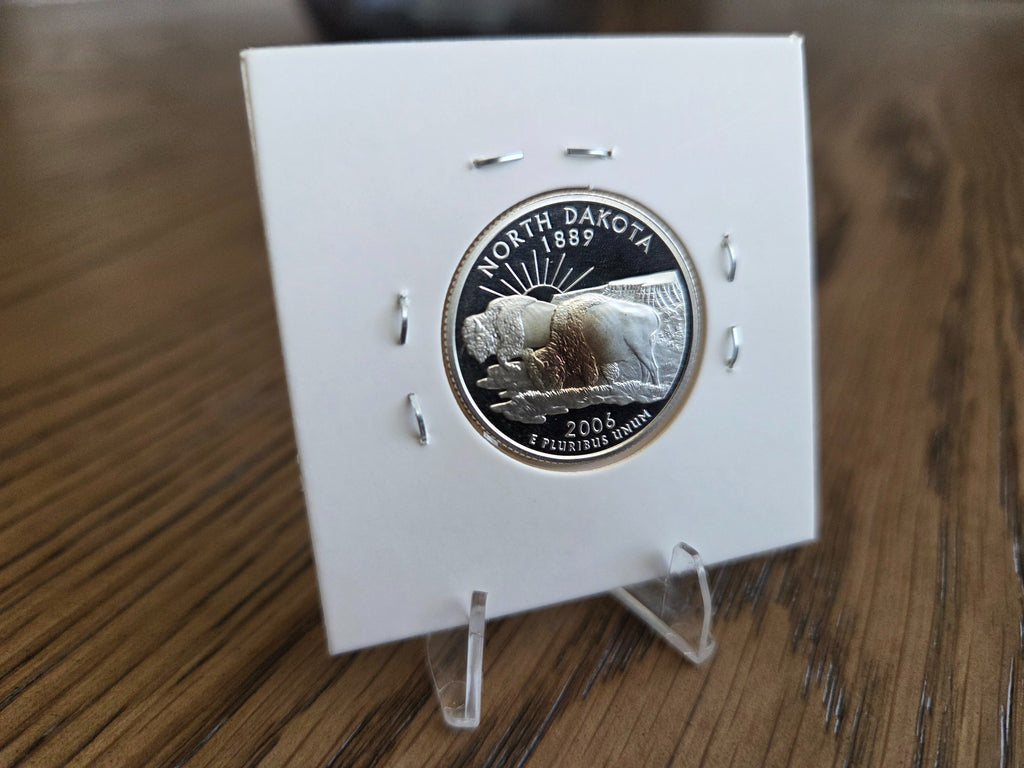 2006-S North Dakota silver proof quarter, reverse of exact coin WQ0009, showing toning